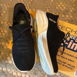 Skechers Black and White Knit Slip-Ons